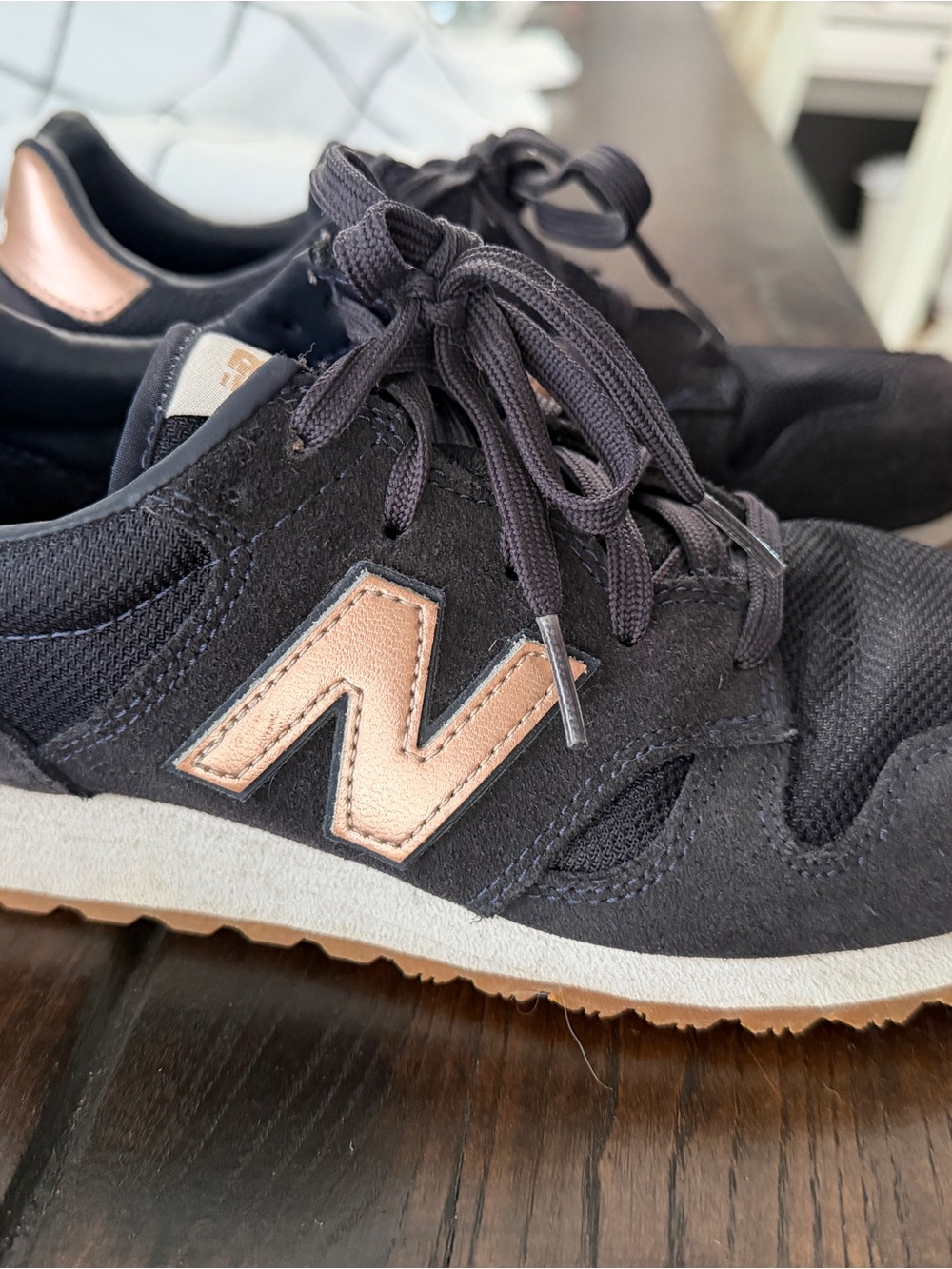 New Balance Women's Navy Sneakers with Rose Gold Logo
